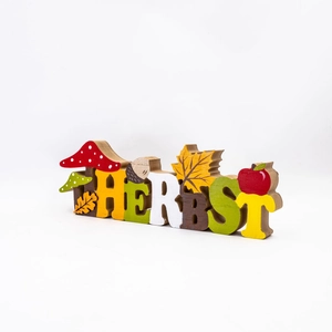 Autumn wooden decoration with HERBST letters featuring squirrels and mushrooms on white base