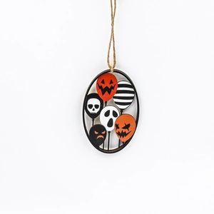 Halloween pumpkin and ghost balloon ornaments in wood frame with hanging rope decoration