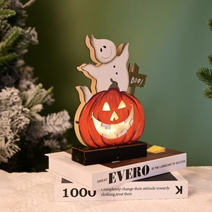 Detail of wooden Halloween decor featuring a 3D ghost, pumpkin, and BOO sign on wood