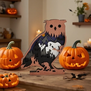 Macro detail of multi-layer wood owl carving with spooky graveyard silhouette scene