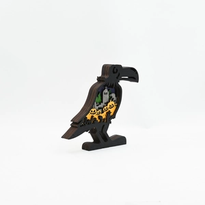 Detailed multi-layer wooden crow carving with pumpkins and tombstones for Halloween decor