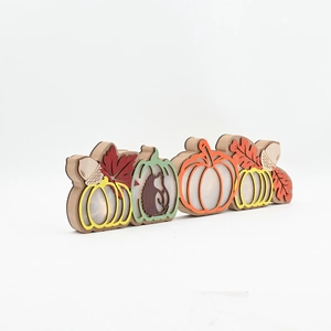 Detailed side view of multi-layered LED wooden harvest pumpkin and hedgehog decoration