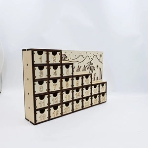 Wooden Advent calendar with 24 drawers featuring laser-cut desert landscape and LED lights
