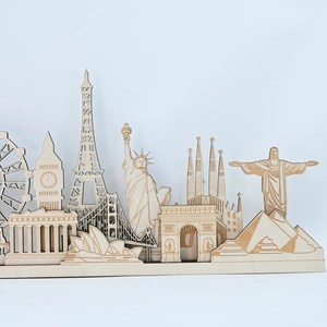 Detailed laser-cut wooden landmarks including Eiffel Tower and Statue of Liberty