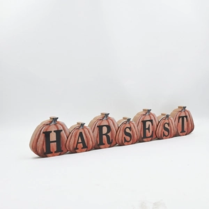 Detailed side view of a 7-piece wooden pumpkin set spelling HARVEST for autumn decor