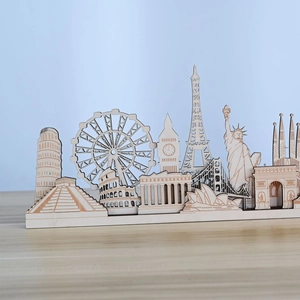Detailed laser-cut wooden world landmarks models including Eiffel Tower and Big Ben