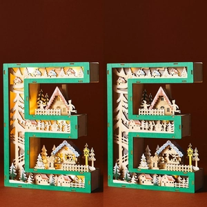 Letter E wooden LED Christmas light with miniature village scene and festive ornaments
