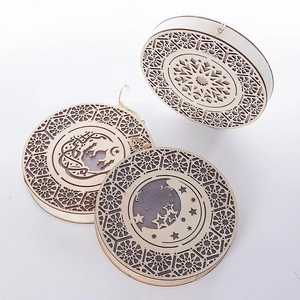 Three-piece laser-cut wooden hanging ornaments with Arabic calligraphy and stars