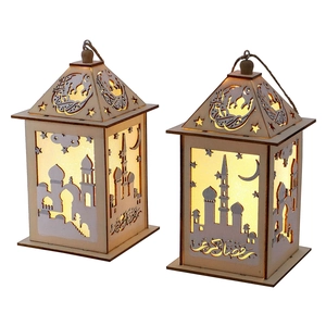 Detail of wooden Ramadan lanterns with intricate laser-cut mosque and crescent patterns