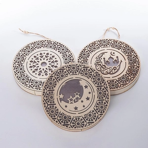 Three-piece set of wooden hollow ornaments with Islamic geometric stars and mosque patterns