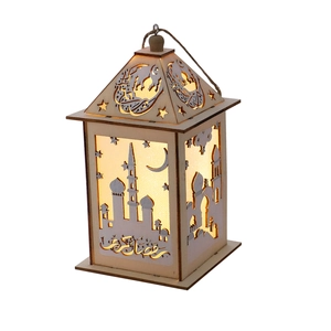 Close-up of wooden Ramadan Kareem lantern with warm LED light and hollow laser-cut patterns
