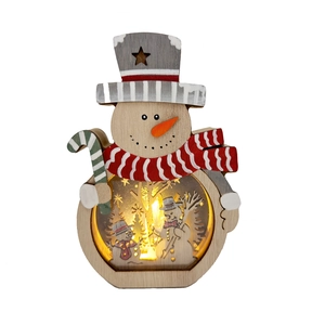 Détail de bonhomme de neige de Noël en bois avec scène miniature intérieure à LED chaude