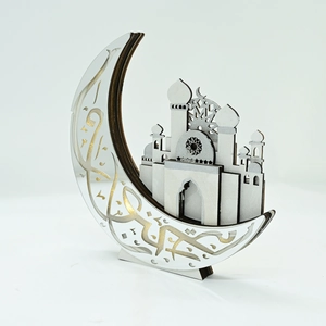 Detailed close-up of a wooden moon ornament with golden Arabic calligraphy for Ramadan