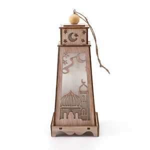 Macro detail of wooden Ramadan lantern featuring intricate laser-cut mosque and moon patterns