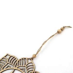 Detail of laser-cut wooden mandala pendant with rustic jute rope and decorative beads