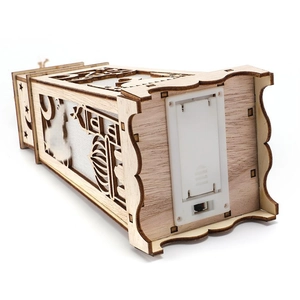 Detail of wooden LED Ramadan pendant showing battery compartment and power switch