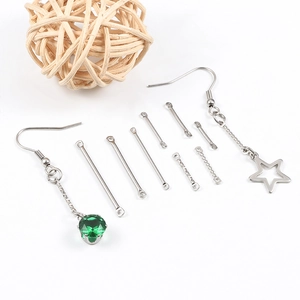 Macro shot of silver stainless steel twisted bar connectors for DIY earring jewelry making