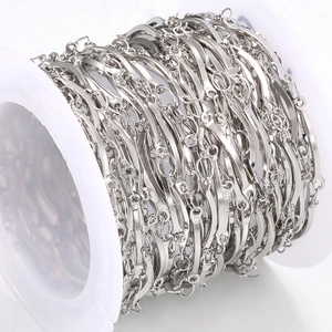 Close-up of DIY stainless steel curved tube chain roll for personalized jewelry making
