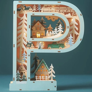 Detail of wooden letter P LED light with carved winter snow scene and mountain view