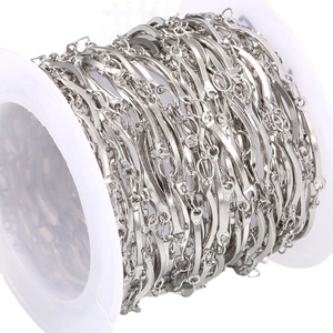 Polished stainless steel curved tube link chain for punk jewelry DIY on white spool