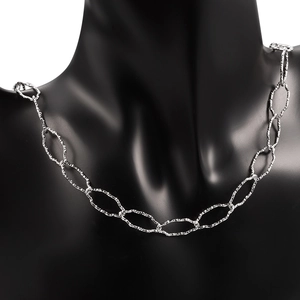 Polished silver stainless steel textured link chain necklace on a black jewelry bust