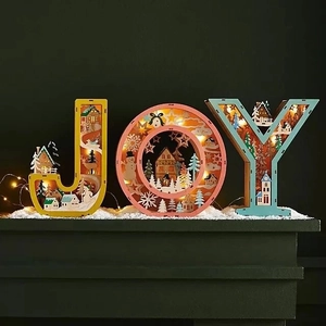 Three-piece wooden JOY Christmas LED light set with hollowed winter village scene decoration