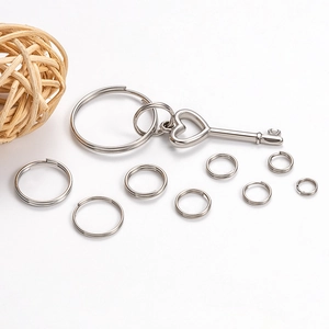 Polished stainless steel double loop keyrings set with a hollow heart charm for DIY jewelry