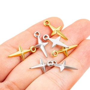 Polished stainless steel four-pointed star pendants in gold and silver finish for jewelry