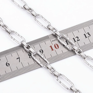 Polished stainless steel cross chain with hammered texture oval links and scale reference