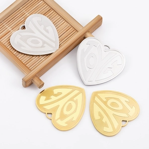 Polished heart-shaped LOVE pendants in gold and silver stainless steel for DIY jewelry