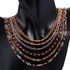 Detailed macro shot of 18k gold plated chains with multi-color enamel oval links