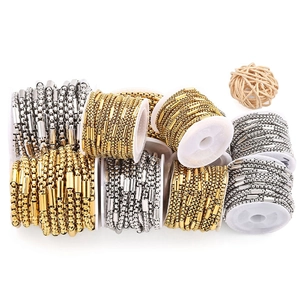 Dettaglio di rotoli di catena fai-da-te in acciaio inossidabile 18k oro e argento