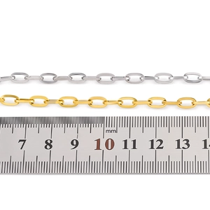 Detailed size measurement of gold and silver stainless steel chain links with ruler