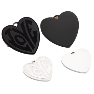 Polished stainless steel heart pendant with LOVE cut-out design in black and white finish