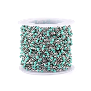 Flat cross chain in stainless steel with turquoise beads on a spool for DIY jewelry