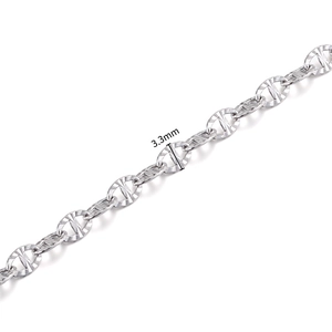 Macro detail of 3.3mm stainless steel mariner anchor chain with diamond-cut finish
