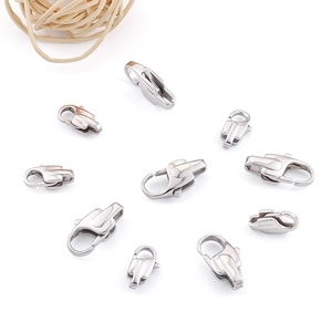 Macro shot of stainless steel lobster clasps in various sizes for jewelry making