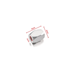 Macro detail of 6x4mm stainless steel hexagonal bead for DIY jewelry making with 2mm hole