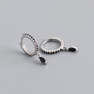 Detail of S925 sterling silver hoop earrings with black marquise cut stones and pave diamonds