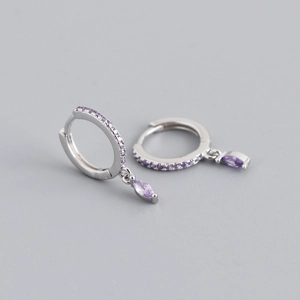Detailed shot of S925 silver hoop earrings with marquise-cut purple stones and micro-pave crystals