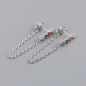 Detailed macro view of S925 silver chain earrings with vibrant colorful zircon stones