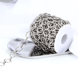 Roll of polished stainless steel link chain for DIY punk jewelry making on white spool