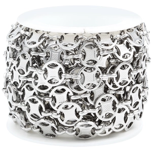 Polished silver stainless steel circle chain with grid pattern on white spool