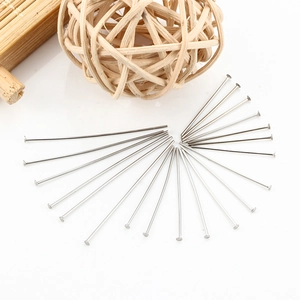 Macro shot of silver stainless steel flat head pins for DIY jewelry making accessories