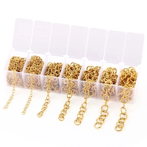 Detailed set of golden stainless steel jump rings in a 7-compartment storage box for DIY jewelry
