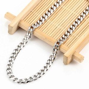 Polished stainless steel curb chain necklace on a bamboo scroll with mirror finish