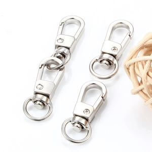 Set of polished silver lobster claw clasps for bags and DIY crafts on white background