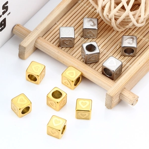 Golden and silver stainless steel cube beads with heart relief for DIY jewelry making
