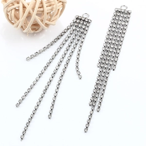 Silver stainless steel fringe tassel earrings with rhinestones on a white background