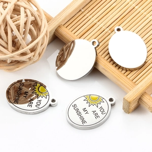 Polished stainless steel oval sun pendants engraved with You Are My Sunshine for DIY